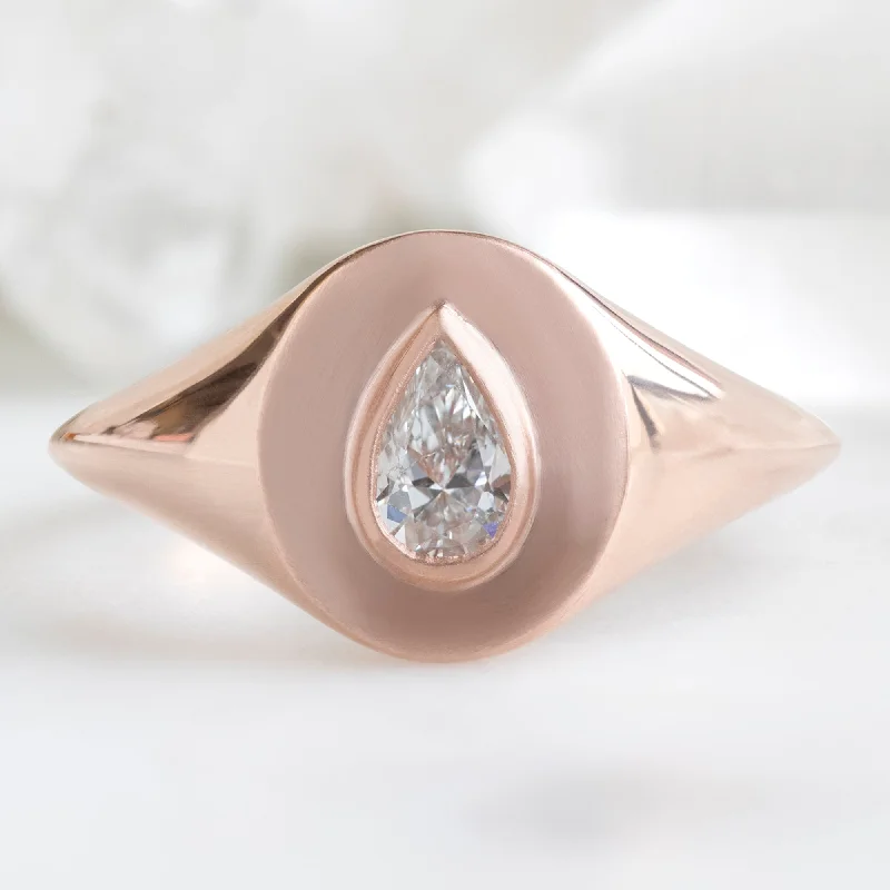 statement silver feather earrings The Signet Ring | 0.32ct Pear White Diamond in 10K Rose Gold