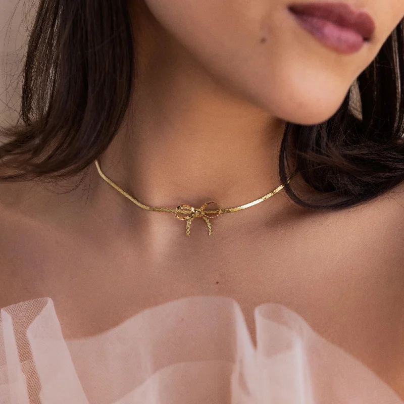 oval blue sapphire ring Herringbone Bow Necklace
