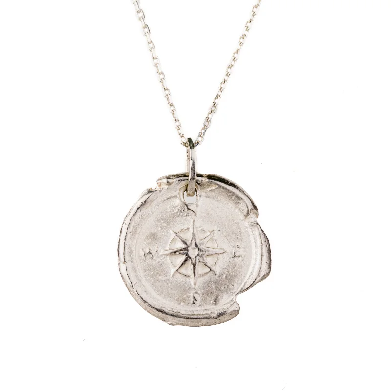 simple turquoise stud earrings The Compass Necklace
